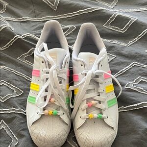 Adidas Kids White Sneakers with Pink, Yellow, and Green Accents